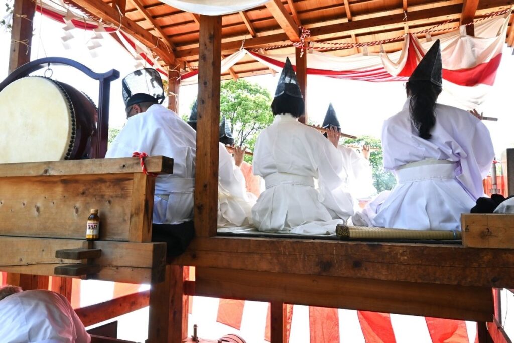 A traditional Shinto shrine during a Japanese festival, reflecting seasonal rituals and local culture